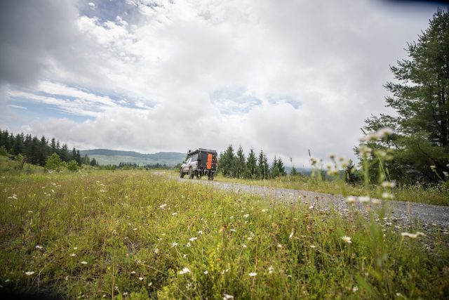 Toyota camper driving on road
